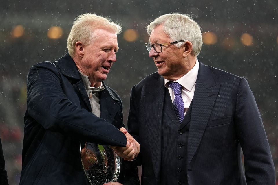 Former Manchester United and FC Twente coach Steve McClaren, left, is presented with a plaque by Sir Alex Ferguson (Martin Rickett/PA)