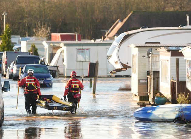 Danger to life flood warning issued as dozens of people rescued by firefighters