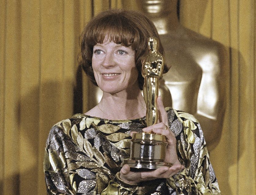 Dame Maggie Smith holds her Oscar for best supporting actress in California Suite in 1979 (Reed Saxon/AP)