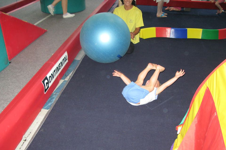 Oliver takes a tumble playing with the inflatable gym ball