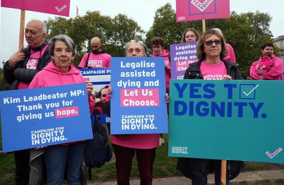 Dignity in Dying campaigners gathered in Parliament Square in support of the new Bill (Lucy North/PA)