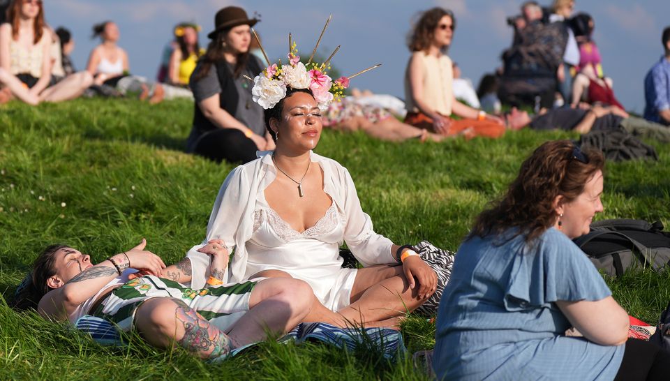 Thousands of people gathered for the Bealtaine Fire Festival at the Hill of Uisneach in Co Westmeath in May (Niall Carson/PA)