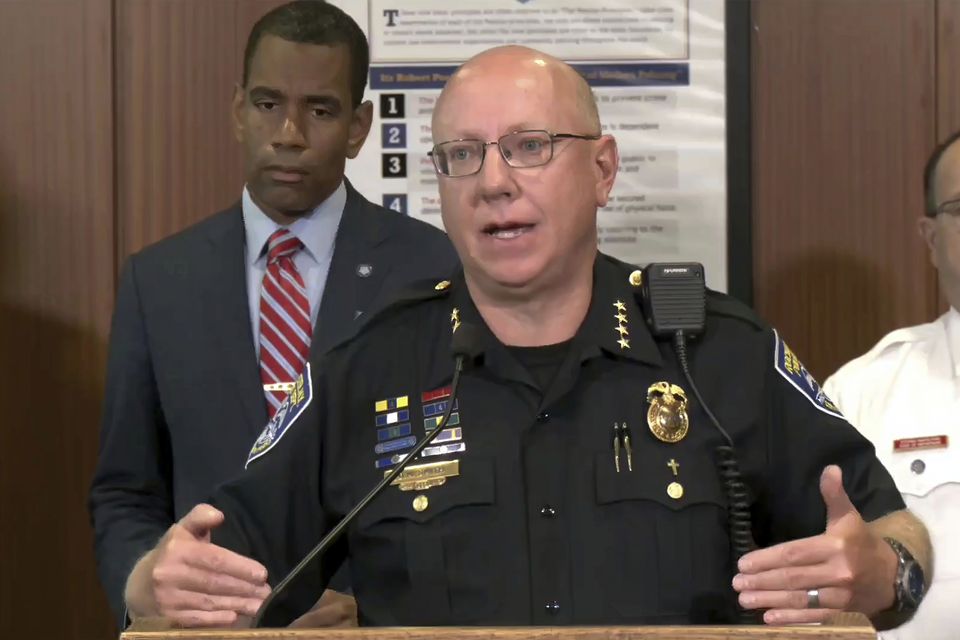 Rochester police chief David Smith, foreground, with Rochester mayor Malik Evans, as he addresses a news conference (New York Police Department/PA)