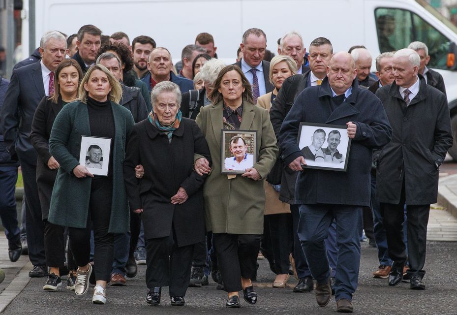 The family of murdered GAA official Sean Brown walk to Belfast High Court on Thursday (Liam McBurney/PA).