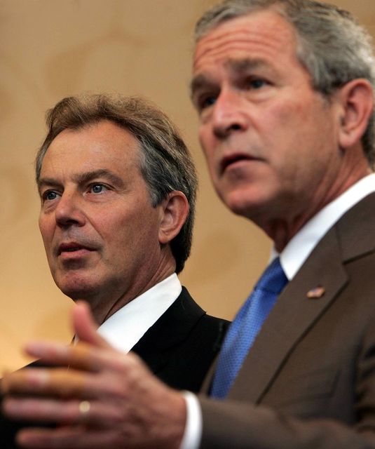 Tony Blair (left) was urged to use his influence with George Bush to pursue a ‘political process’ in Fallujah, Iraq (Kirsty Wigglesworth/PA)