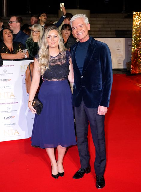 Molly with Phillip Schofield (Ian West/PA)