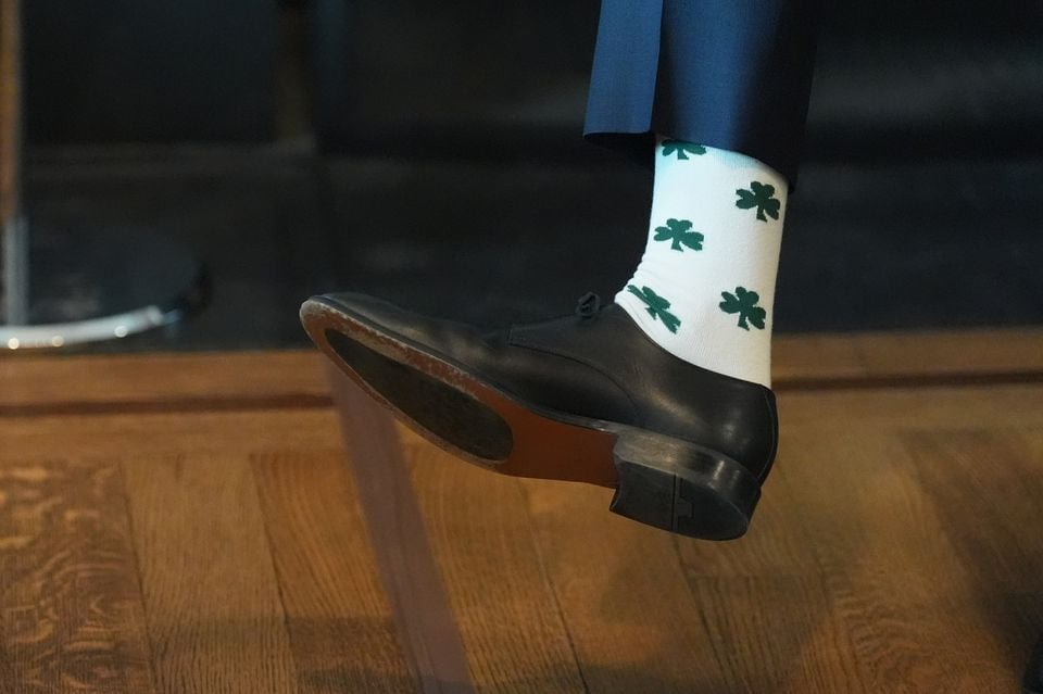 JD Vance showing off his shamrock socks (Niall Carson/PA)