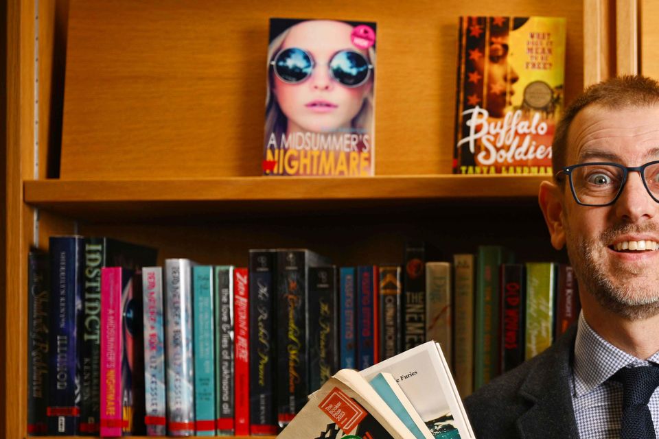 Stuart Hamilton, head of libraries development at the LGMA, with a selection of some of the most borrowed library books of 2024 (Bryan Meade/Mediaconsult)