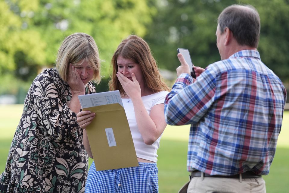 Results day can be an emotional time for students and parents (Jacob King/PA)