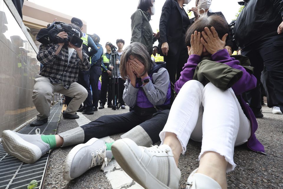 Bereaved family members of victims of the crush said the ruling was ‘dishonest’ and called for prosecutors to appeal (Lim Hwa-young/Yonhap via AP)