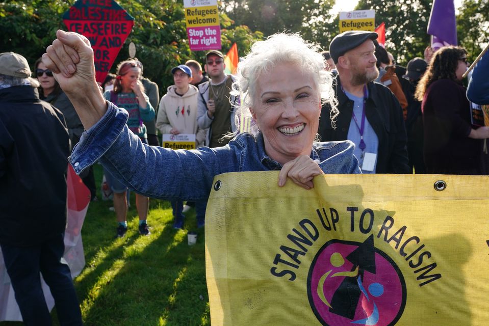 A demonstrator during the protest organised by Stand Up to Racism (PA)