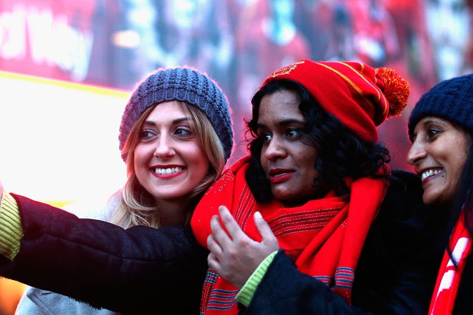 The beautiful game - football fans from around the world -  Liverpool fans take a selfie prior to the Premier League match between Liverpool and Swansea City at Anfield on December 26, 2017 in Liverpoo