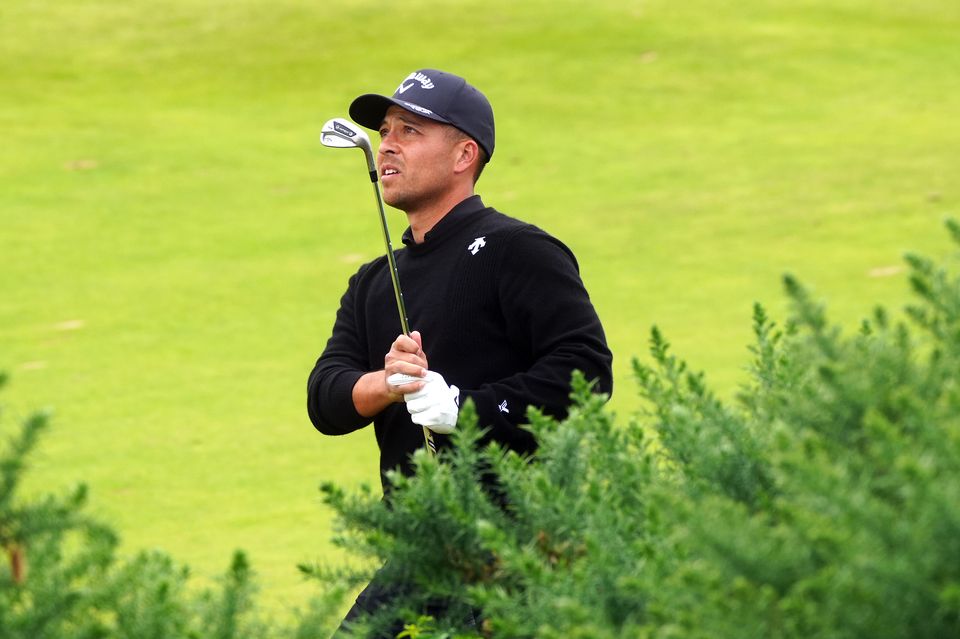 Xander Schauffele plays from the 11th fairway to set up a crucial birdie during day four of The 152nd Open at Royal Troon (Owen Humphreys/PA)