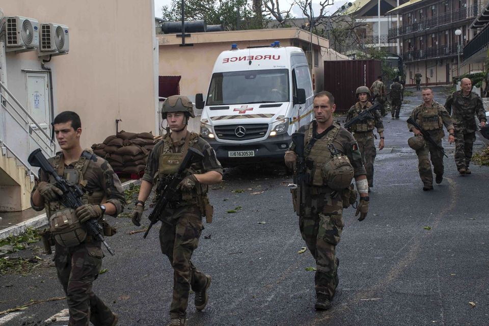 The French Army shows soldiers patrolling in the French territory of Mayotte in the Indian Ocean after Cyclone Chido (Etat Major des Armees via AP)