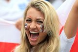 thumbnail: An England fan wearing face paint before the game during the Group D match in the Estadio do Sao Paulo, Brazil