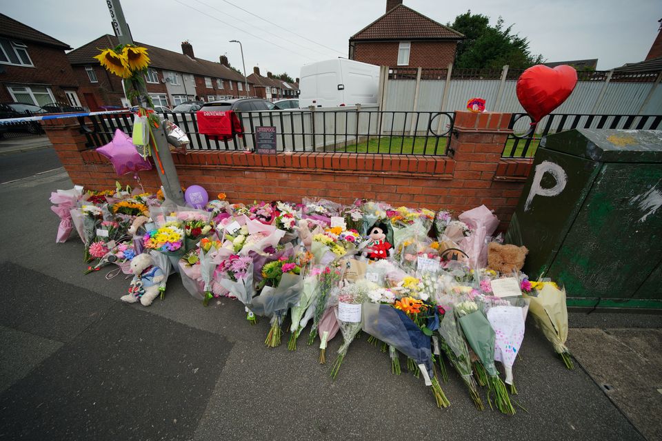 Flowers near the scene in Knotty Ash, Liverpool, where nine-year-old Olivia Pratt-Korbel was fatally shot (Peter Byrne/PA)