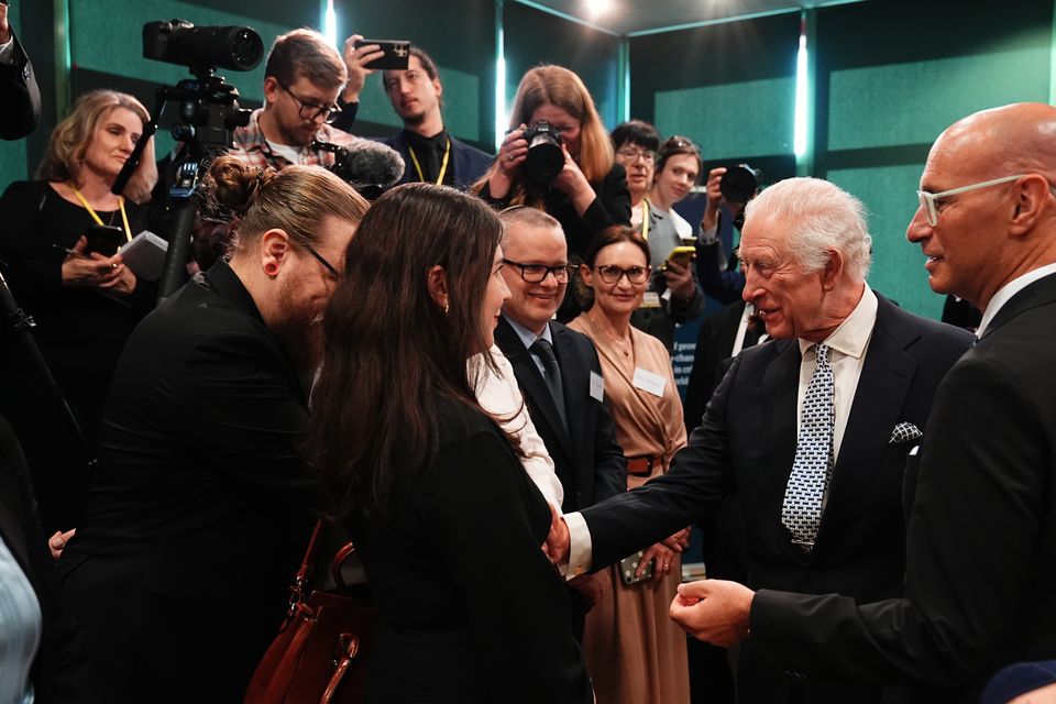 Charles met members of the community during his visit to the centre (Aaron Chown/PA)