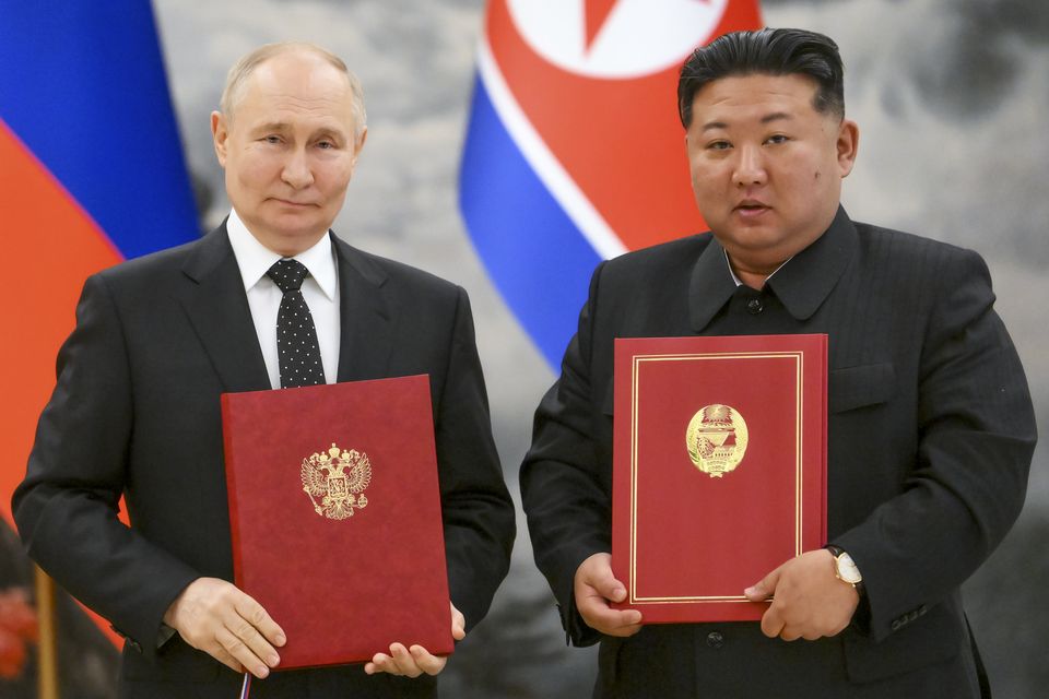 Russian president Vladimir Putin, left, and North Korea’s leader Kim Jong Un pose for a photo during a signing ceremony of the new partnership in Pyongyang,  (Kristina Kormilitsyna, Sputnik, Kremlin Pool Photo via AP)