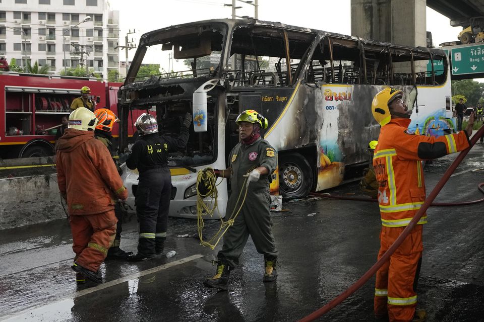 Rescuers worked at the scene (Sakchai Lalit/AP)