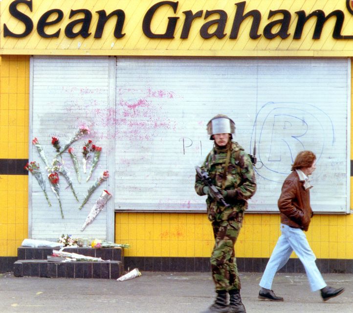 The scene outside Sean Graham's Bookmakers on the Ormeau Road, where two gunmen opened fire, killing four men and injuring others.