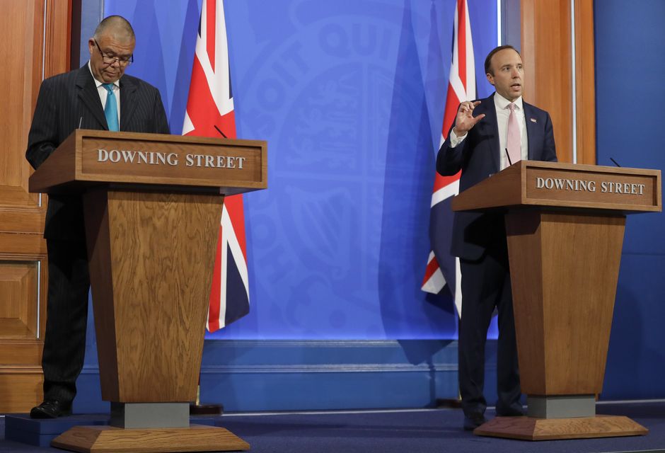 Professor Jonathan Van Tam appearing on a media briefing with then-health secretary Matt Hancock in April 2021 (Kirsty Wigglesworth/PA)