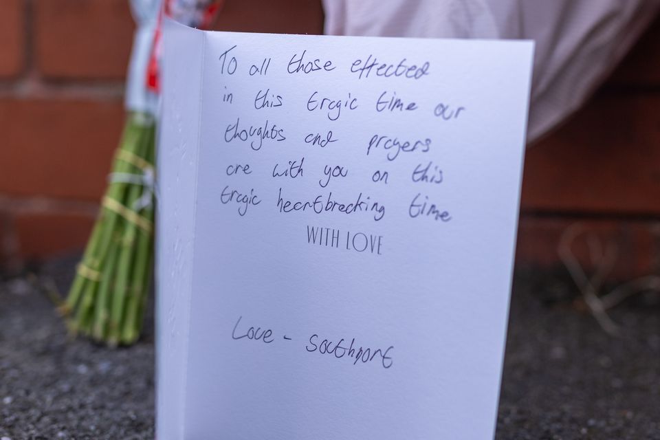 A card signed ‘Love – Southport’ near the scene of the fatal stabbings in Hart Street (James Speakman/PA)