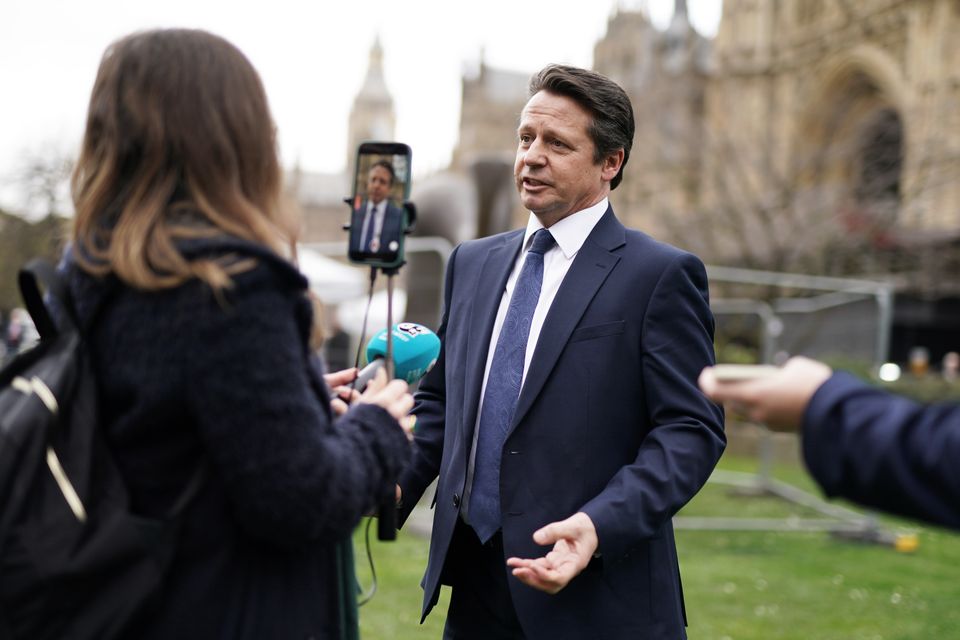 Nigel Huddleston speaks to reporters after the Budget (PA)