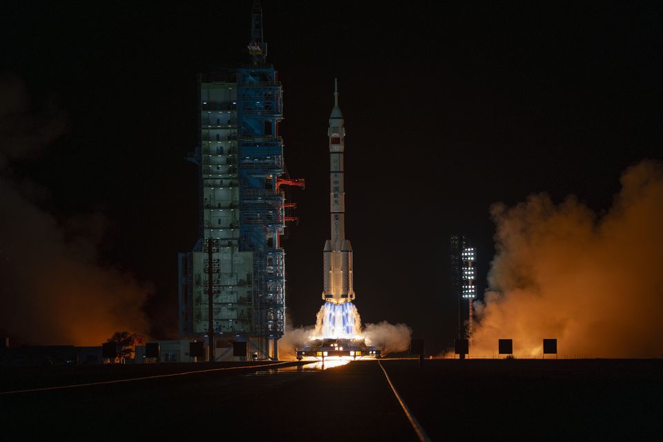 A Shenzhou-19 spacecraft atop a Long March rocket takes off from the Jiuquan Satellite Launch Centre in northwestern China (Ng Han Guan/AP)