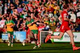 thumbnail: 20 April 2024; Daire O'Baoill of Donegal shoots to score his side's second goal during the Ulster GAA Football Senior Championship quarter-final match between Derry and Donegal at Celtic Park in Derry. Photo by Seb Daly/Sportsfile