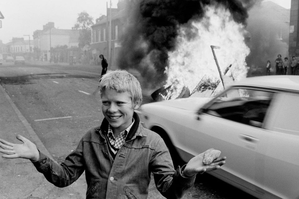 Youth with a stone during a riot at the top of Leeson Street, west Belfast, 1978. Photo credit: Chris Steele-Perkins/Magnum Photos