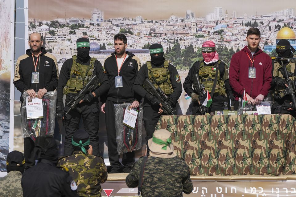 Israeli hostages Iair Horn, Sagui Dekel Chen and Alexander Troufanov were escorted by Hamas and islamic Jihad fighters Abdel Kareem Hana/AP)