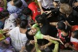 thumbnail: Relatives and neighbors mourn as they attend the funeral of Haresh Gohil, a 16 year old boy who was killed by gunmen near Chabad-Lubavitch center,also known as Nariman House in Mumbai, India, Saturday, Nov. 29, 2008. Indian commandos killed the last remaining gunmen holed up at a luxury Mumbai hotel Saturday, ending a 60-hour rampage through India's financial capital by suspected Islamic militants that rocked the nation.(AP Photo/Gurinder Osan)