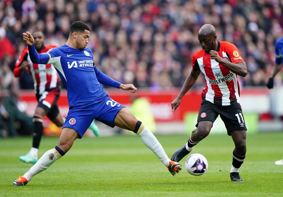 Chelsea's Levi Colwill and Brentford's Yoane Wissa (right) battle for the ball (PA)