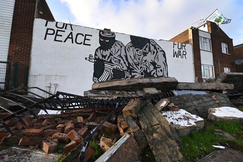 A loyalist paramilitary mural is pictured damaged following high winds on December 7, 2024 in Belfast, Northern Ireland. (Photo by Charles McQuillan/Getty Images)