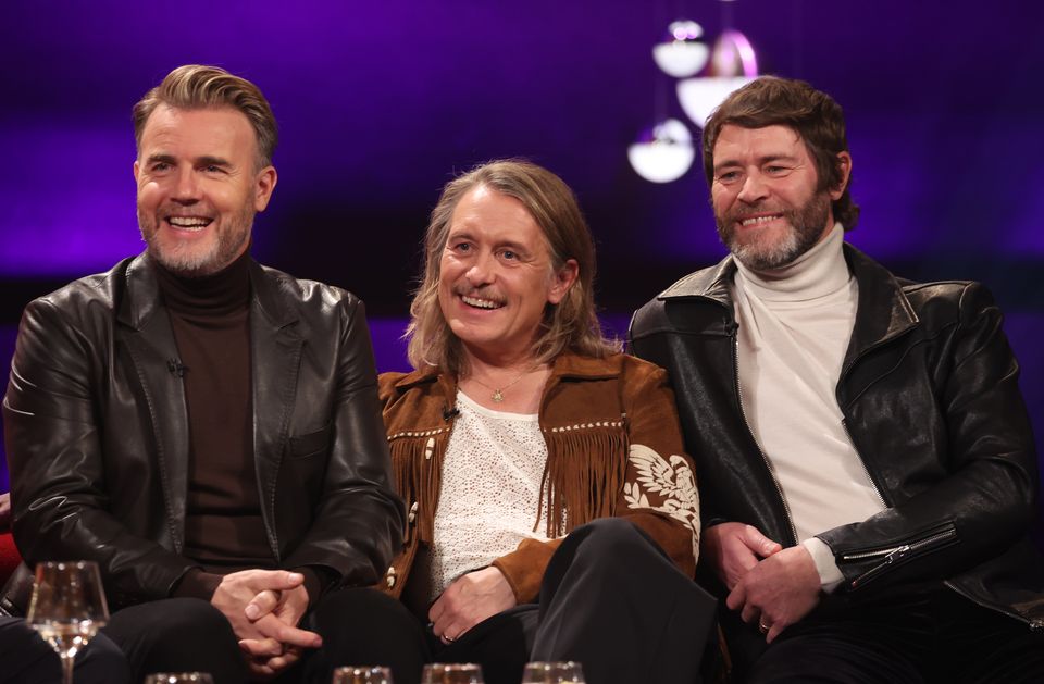 Gary Barlow, Mark Owen and Howard Donald of Take That. (Isabel Infantes/PA)