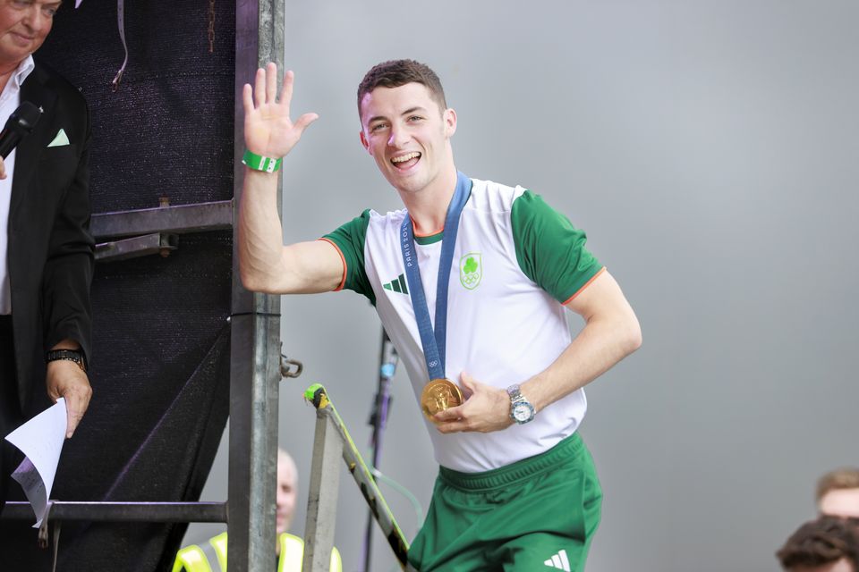 Ireland’s Rhys McClenaghan wears his gold medal during a homecoming event (Liam McBurney/PA)