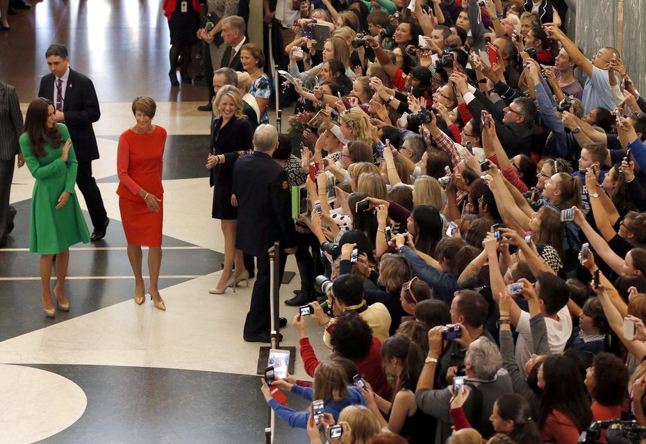 The Duchess of Cambridge waves as she arrives at Parliament House in Canberra in 2014 (Phil Noble/PA)