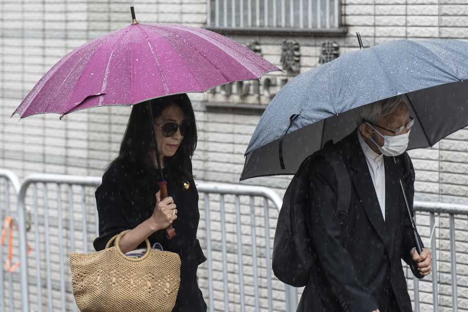 Jimmy Lai’s wife Teresa Lai and retired Chinese cardinal Joseph Zen Ze-Kiun were at West Kowloon Magistrates’ Courts (AP)