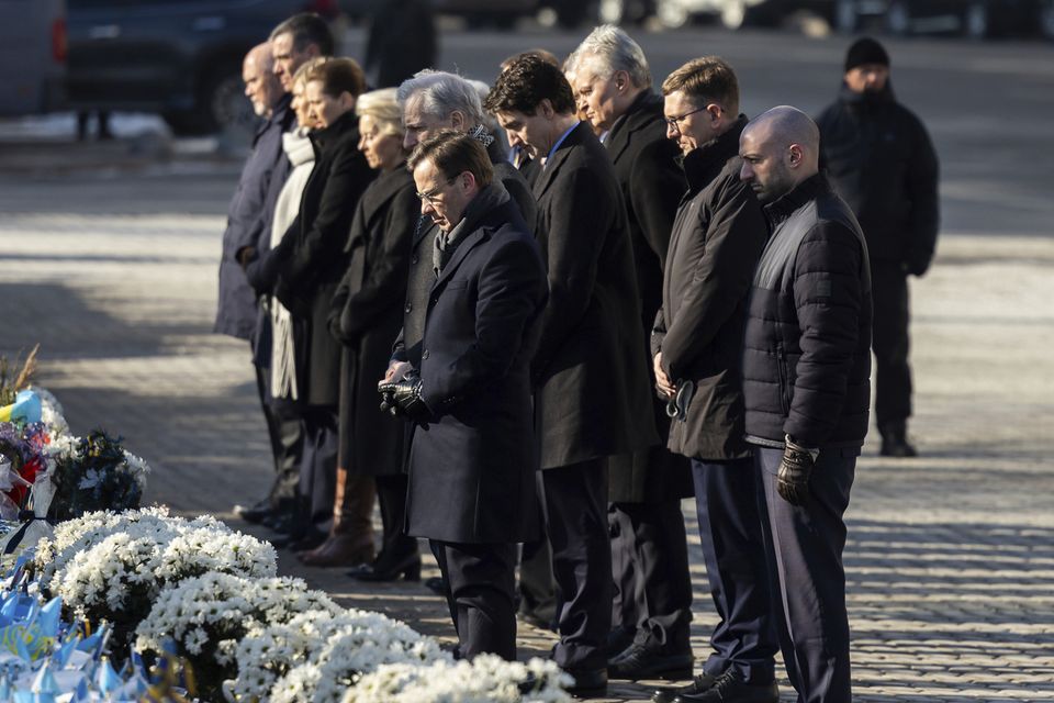 European leaders attend a ceremony at the memorial to the fallen Ukrainian soldiers in Kyiv (Ukrainian Presidential Press Office via AP)