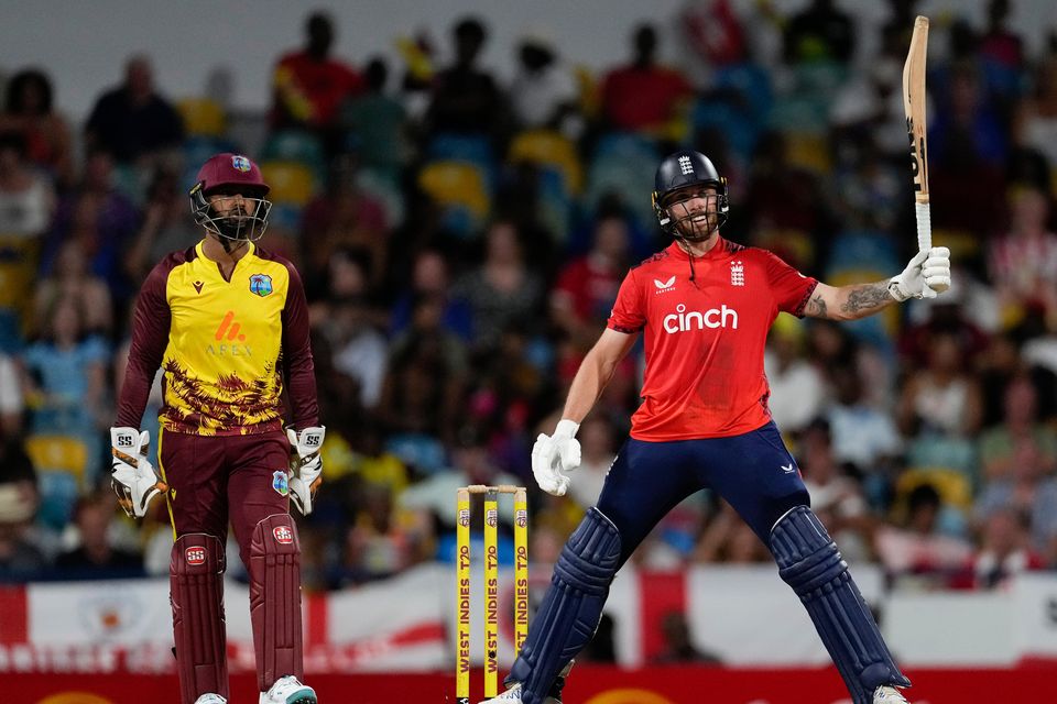 Salt swings the bat after playing a shot against the West Indies (Ricardo Mazalan/AP)