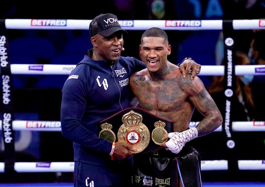 Conor Benn (right) celebrates with his dad Nigel Benn after knocking out Chris Algieri (Nick Potts/PA)