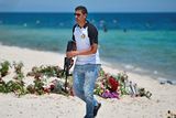 thumbnail: SOUSSE, TUNISIA - JUNE 30:  Armed police continue to patrol Marhaba beach, where 38 people were killed in a terrorist attack last Friday, on June 30, 2015 in Sousse, Tunisia. British police have been deployed to the area as part of one of the biggest counter terror operations since the London bombings on July 7, 2005. (Photo by Jeff J Mitchell/Getty Images)