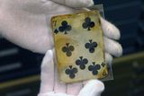 thumbnail: A seven of clubs card is shown as part of the artifacts collection at a warehouse in Atlanta, Friday, Aug 15, 2008. The 5,500-piece collection contains almost everything recovered from the wreckage of the RMS Titanic, which has sat 2.5 miles below the surface of the Atlantic ocean since the boat sank on April 15, 1912.