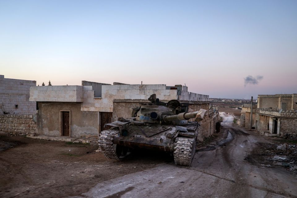 A destroyed Syrian army tank sits in the village of Anjara (Omar Albam/AP)