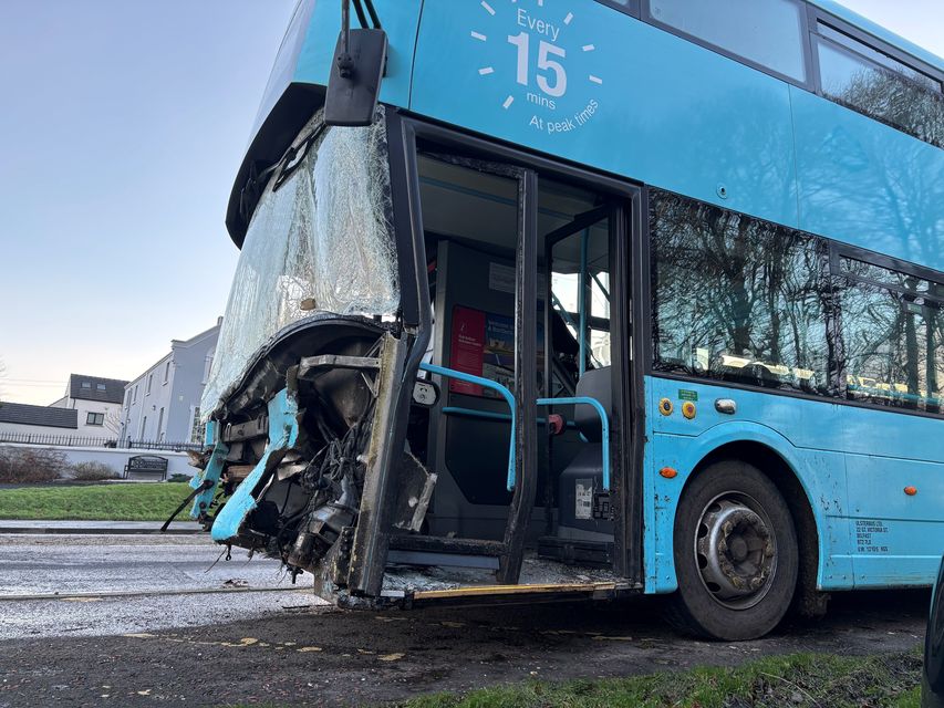 The wreckage of an airport bus which crashed on the way to Belfast International Airport during Storm Darragh (Rebecca Black/PA)