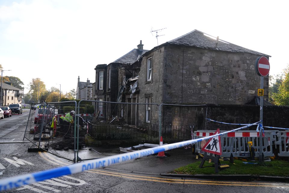 Emergency crews attended the block of flats after an explosion (Andrew Milligan/PA)