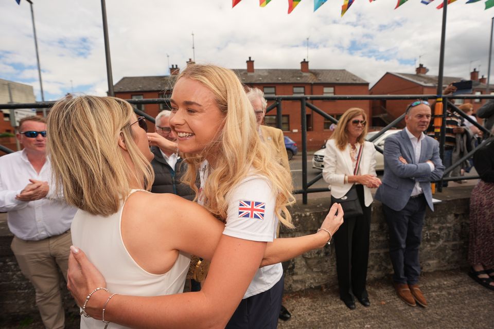 Hannah Scott (right) visits Bann Rowing Club in Coleraine (Niall Carson/PA)