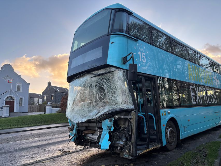 The wreckage of an airport bus which crashed on the Ballyrobin Road close to Belfast International Airport in the early hours of Saturday amid Storm Darragh (Rebecca Black/PA)