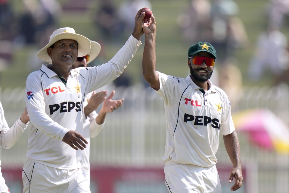 Noman Ali, left, and Sajid Khan took 19 of the Tests 20 England wickets between them (Anjum Naveed/AP)