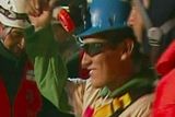 thumbnail: In this screen grab taken from video, Carlos Mamani, the fourth miner to be rescued, celebrates after his rescue Wednesday, Oct. 13, 2010 at San Jose Mine near Copiapo, Chile. Mamani had just started working as a heavy-equipment operator at the mine when it it collapsed.  (AP Photo)